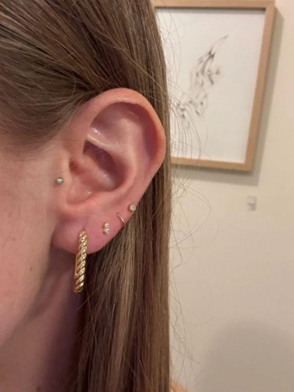 The Bella Gold Sterling silver oval hoops hoop earrings twist twisted
